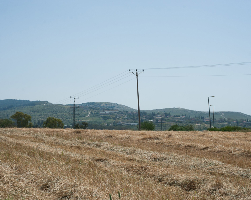 Electric wires in a dry field.